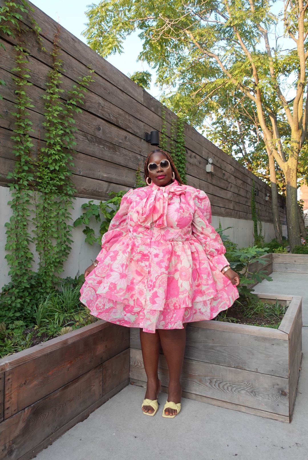 pink floral plus size shirtdress with a tie neck detail from ASOS paired with chloe sunglasses.