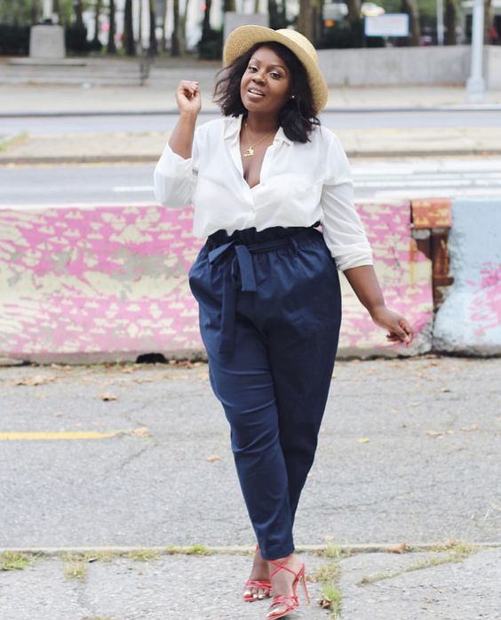 Dark green fitted linen pants with paper bag waist