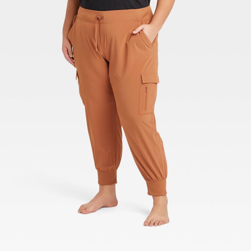 Do you need cargo pants outfit ideas? Here's 5 ways I'm styling my plus  size cargo pants for spring. My fave looks are the orange b