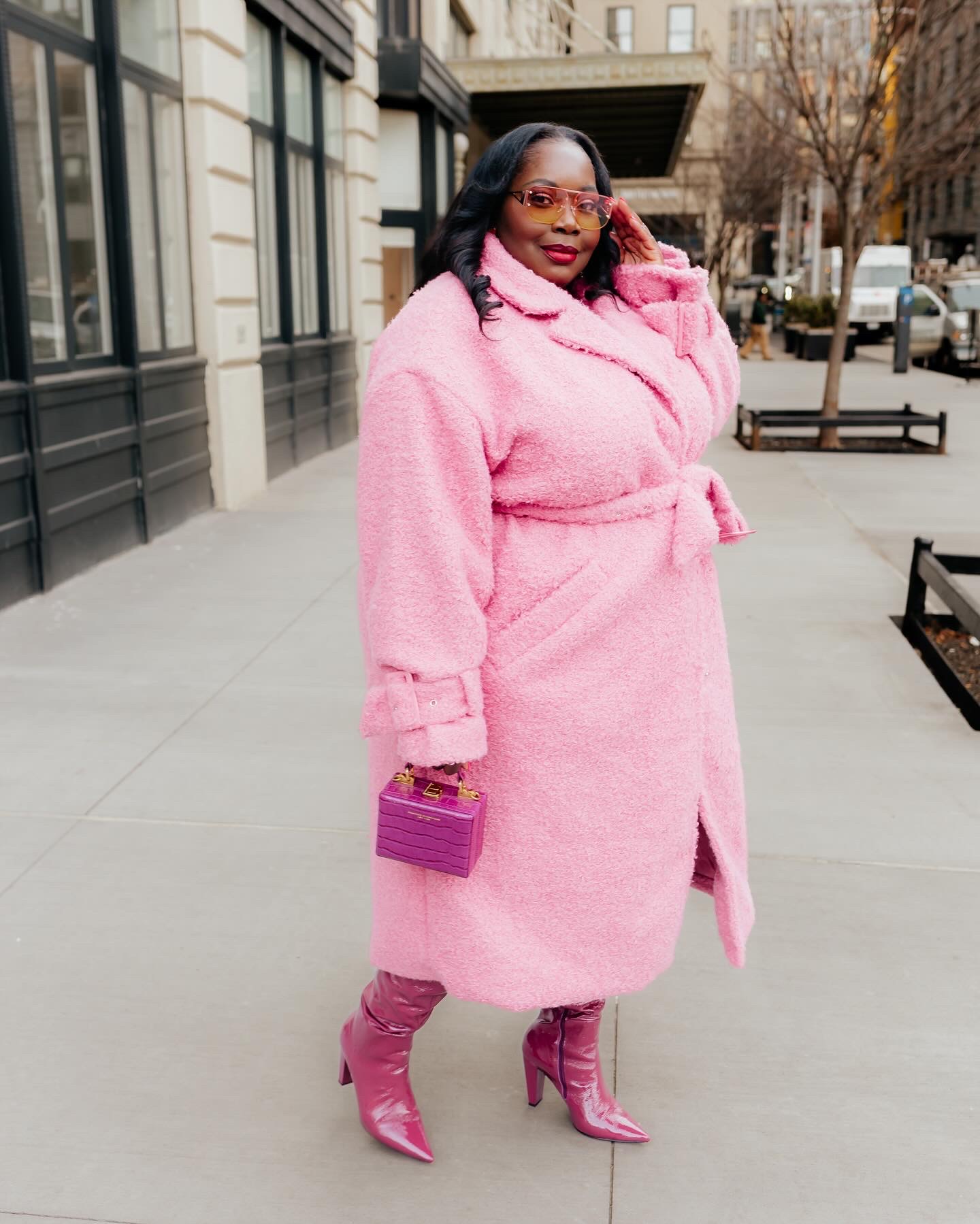  New York Fashion Week style. plus size winter coat in pink with purple patent leather boots from vince camuto