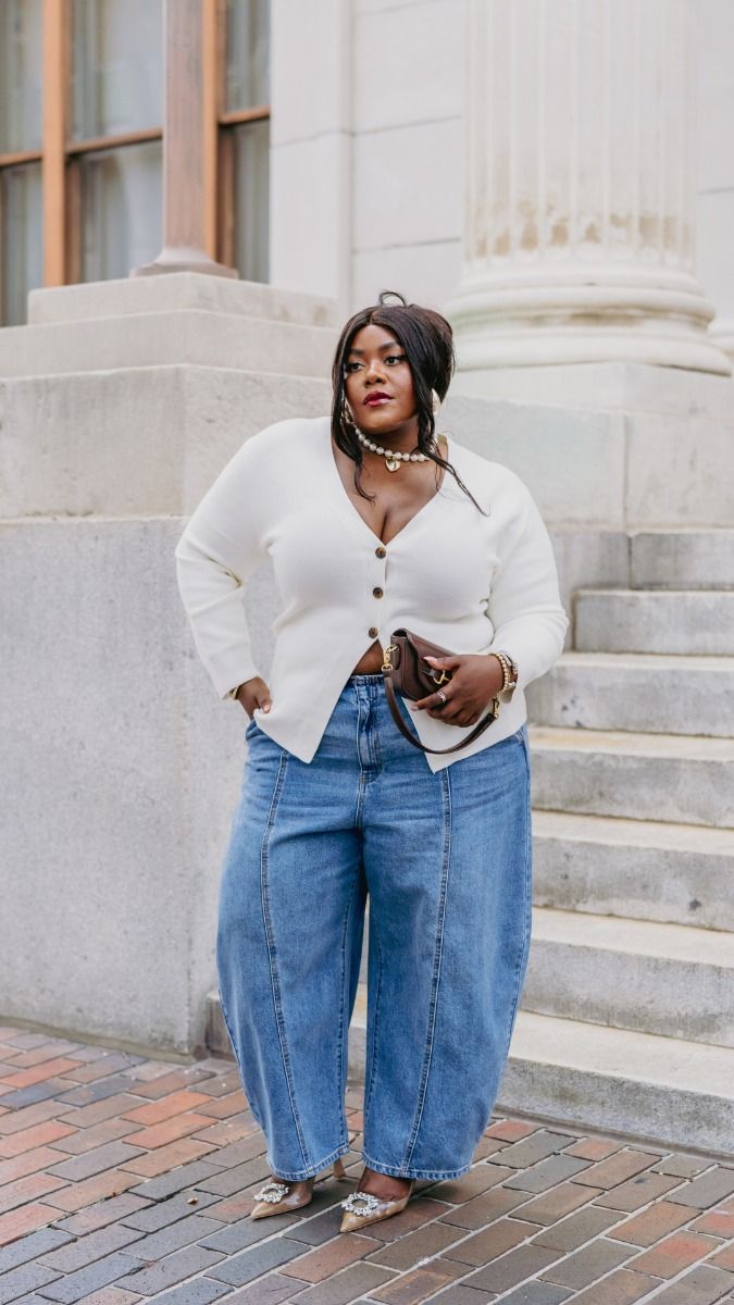 feminine outfit with barrel leg jeans paired with a cardigan