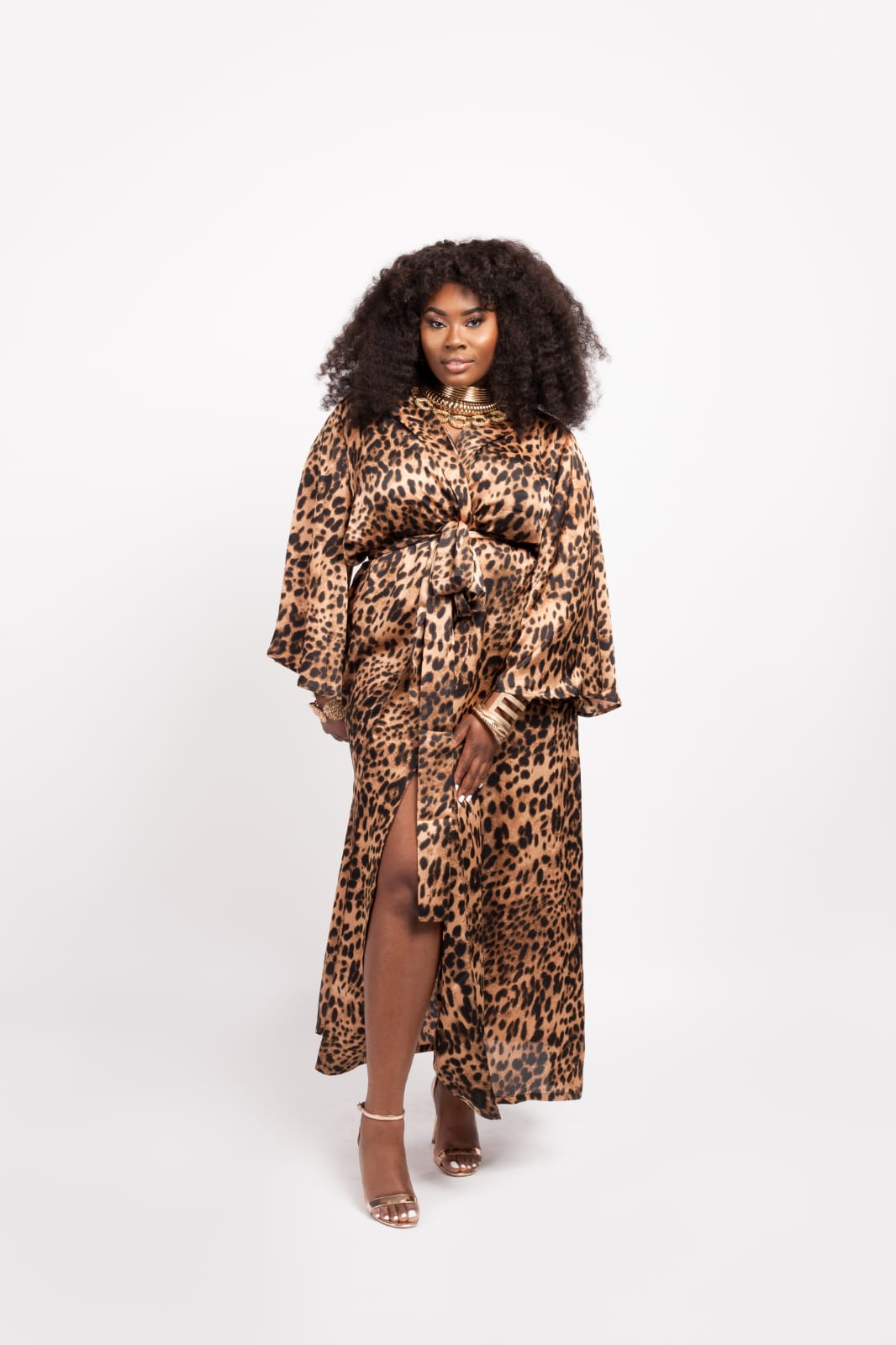 A styled leoaprd robe on a curvy woman