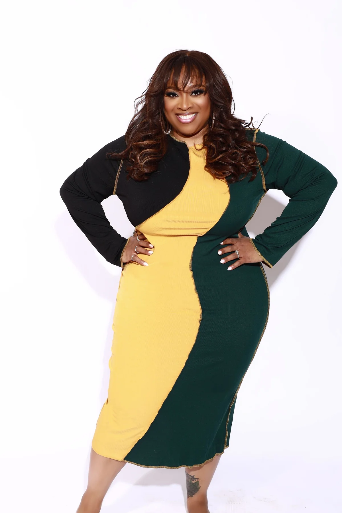 Kiera Sheard in a bodycon plus size dress from Eleven60